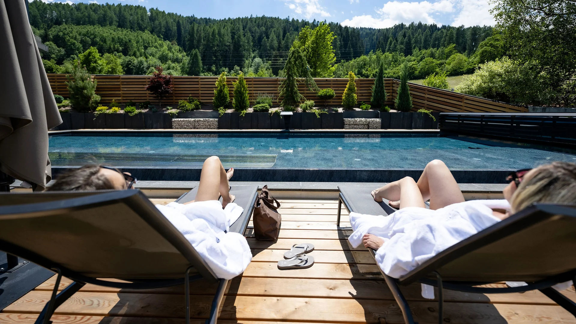 Tevini Resort | Dolomites. Hotel. Pool. Tevini Resort | Dolomites. Hotel. Pool.