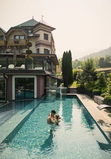 Tevini Resort | Dolomites. Hotel. Pool. Tevini Resort | Dolomites. Hotel. Pool.